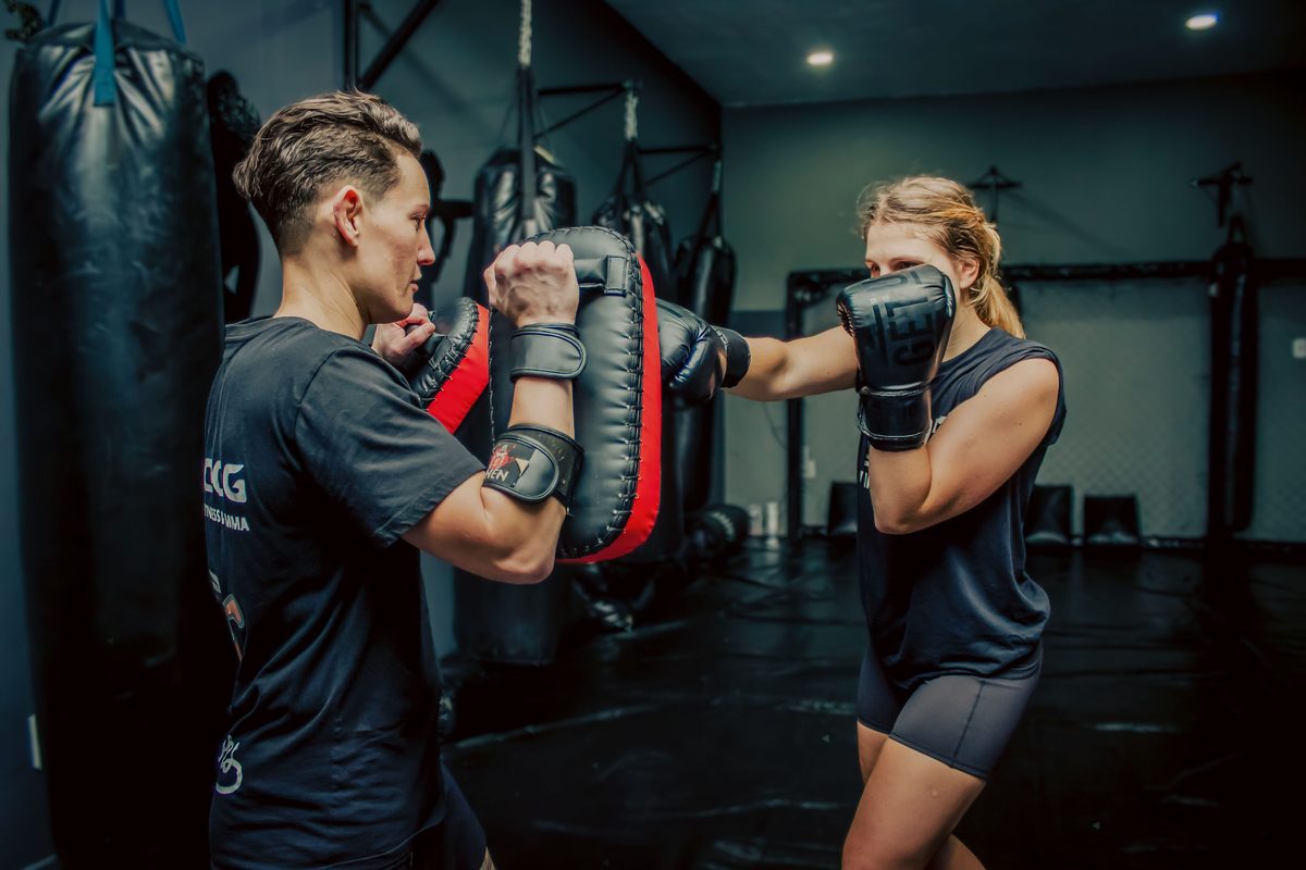 Beginner women’s boxing fitness class doing pad work at Maddog Performance Institute in Ballito